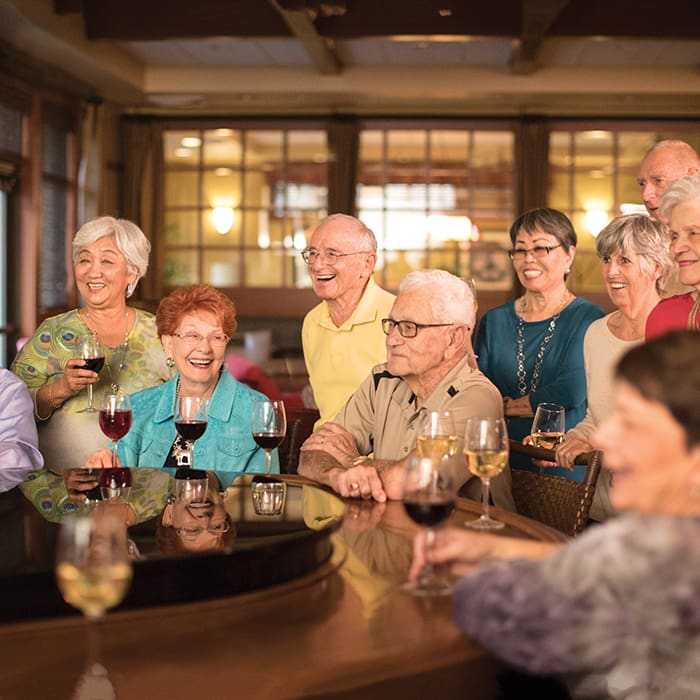 Residents during happy hour offered at Walnut Village