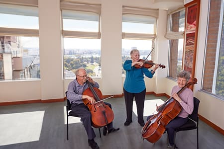 St. Paul's Towers residents playing musical instruments