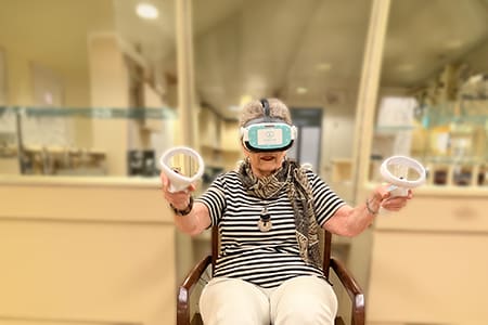 Senior resident using VR headset