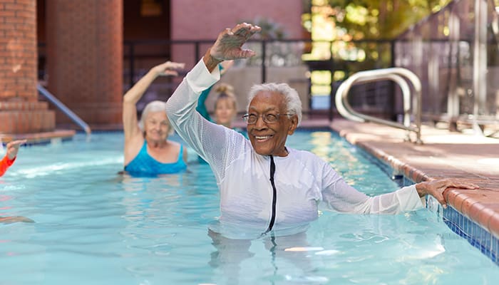 Residents taking part in aqua fit class at Webster House fitness center