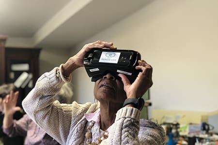 Front Porch residents using VR headset