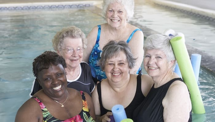 Portrait of group at the England Oaks aquatic facility