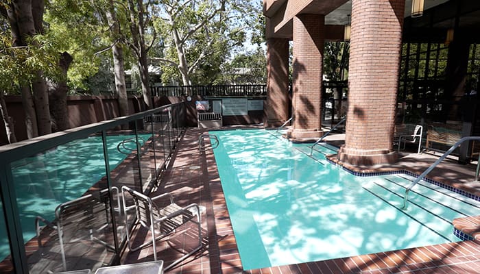 Webster House offers residents the opportunity to lounge by the pool