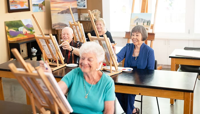 Portrait of group during painting class