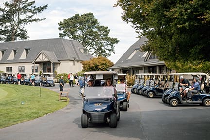 Golfers driving golf carts at Berkeley Country Club