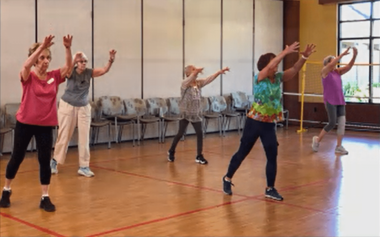 A group dance class at Spring Lake Village gets participants moving.