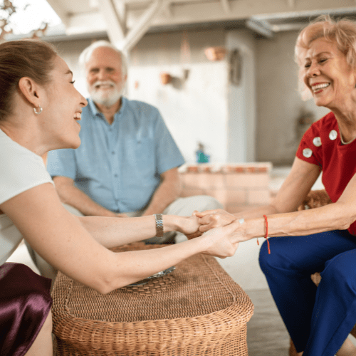 Woman support elderly couple