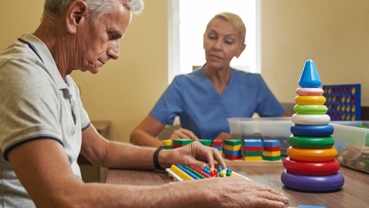 an old man having cognitive exercises 