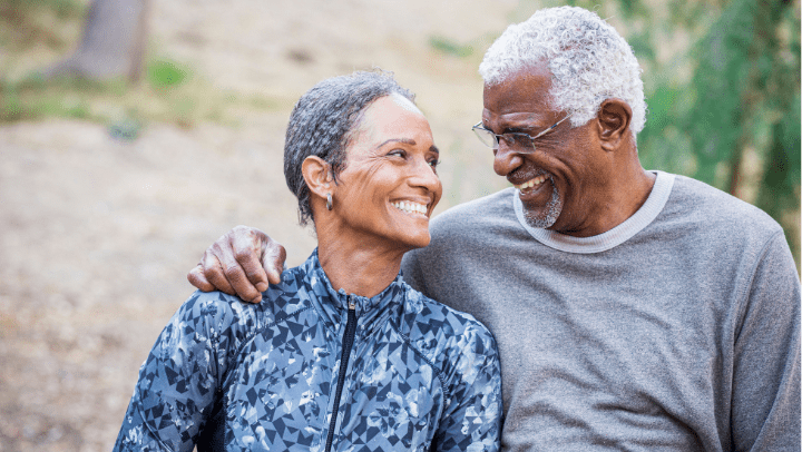 a couple of seniors smiling each other