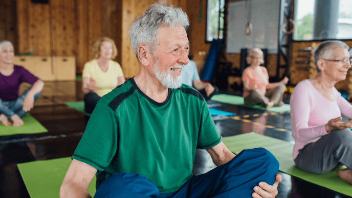 an old man doing yoga