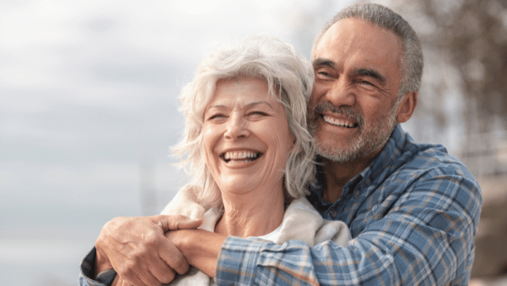 a couple of seniors smiling