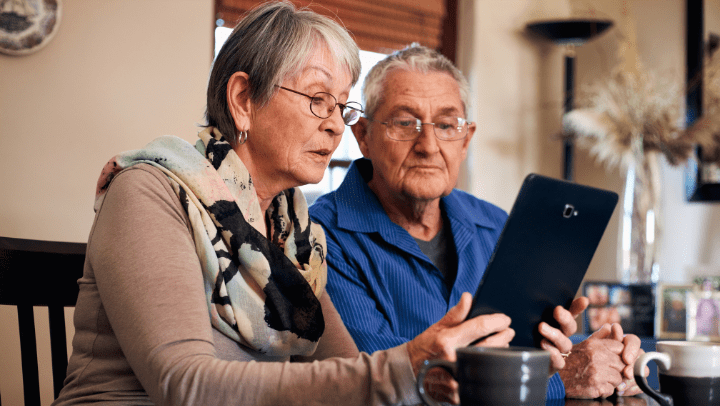 a couple of seniors reading