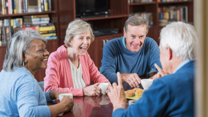 A group of seniors laughing. 