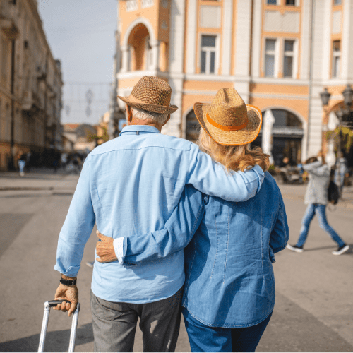 elderly couple traveling