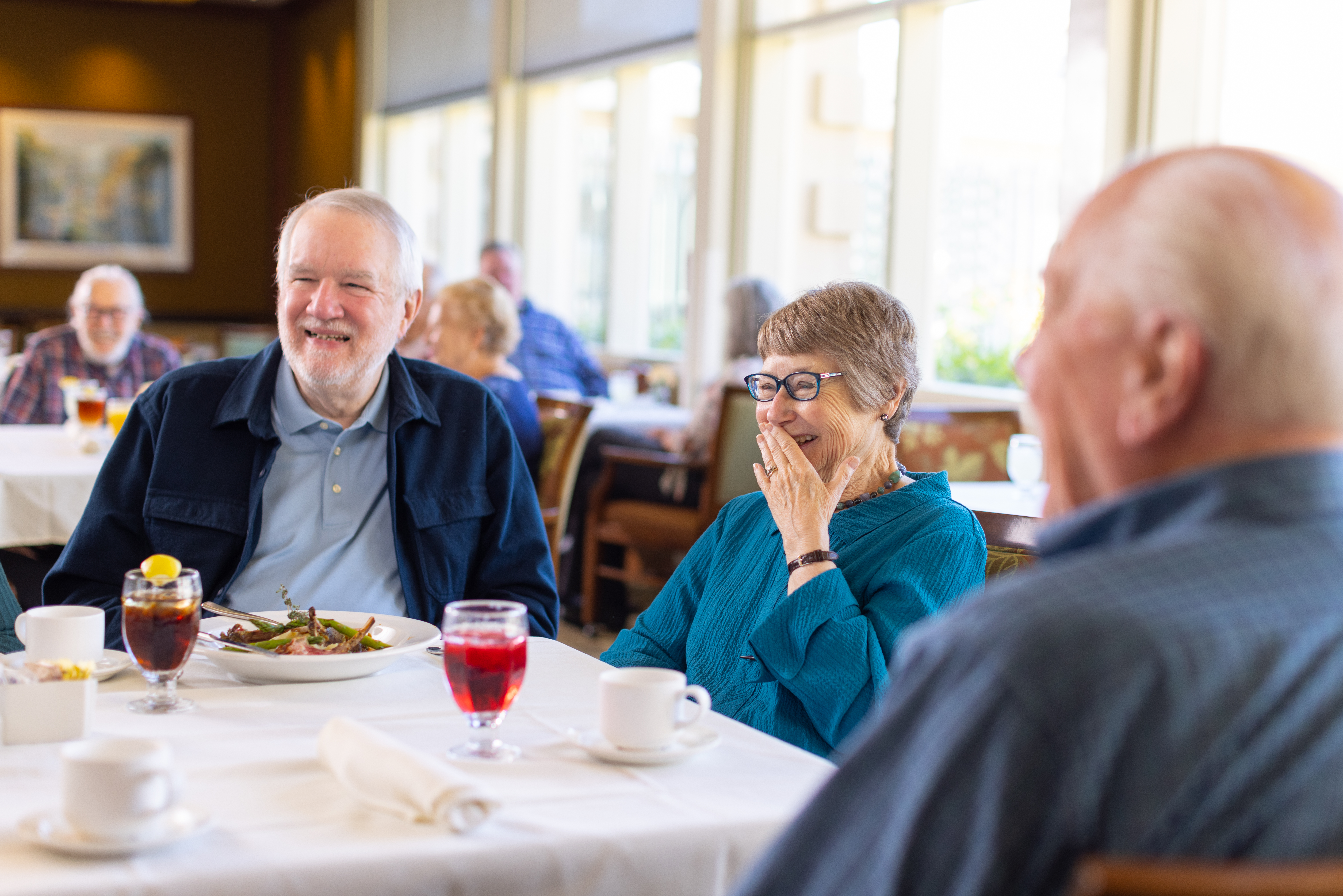 seniors sharing dinner