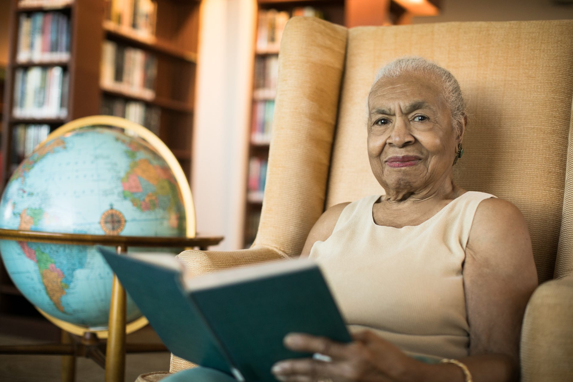 an old lady reading a book