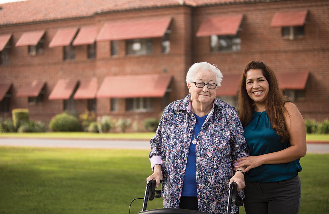 old woman with a family member