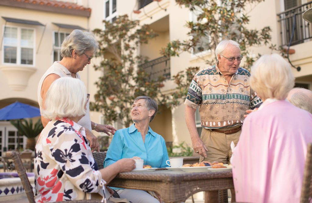 Group of old people eating