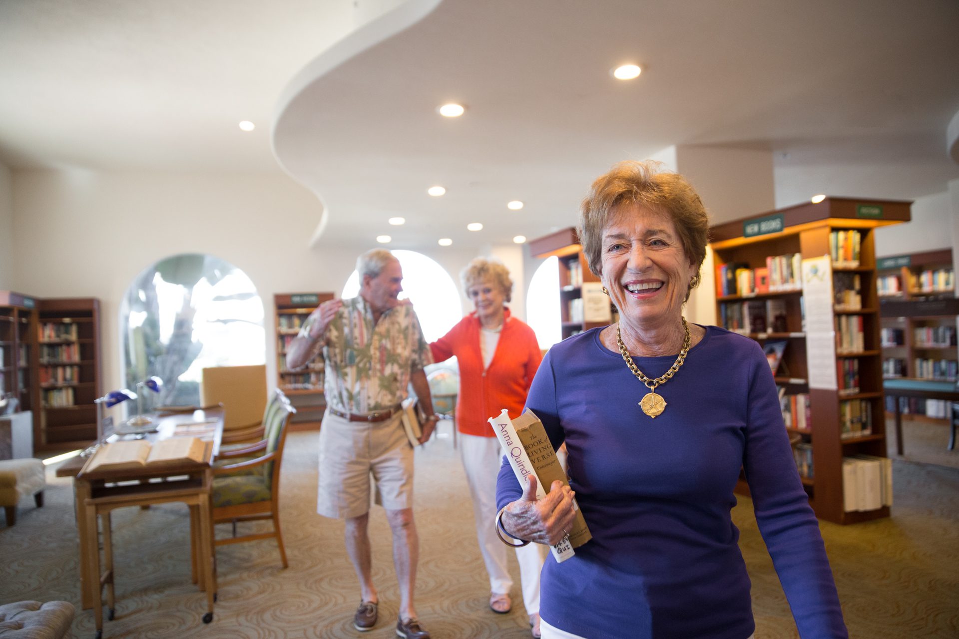 a senior lady in a library