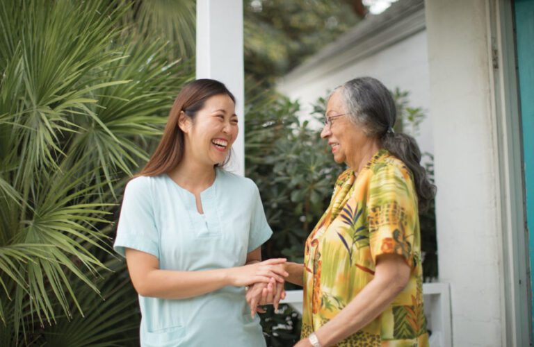 an old lady smiling at her daughter