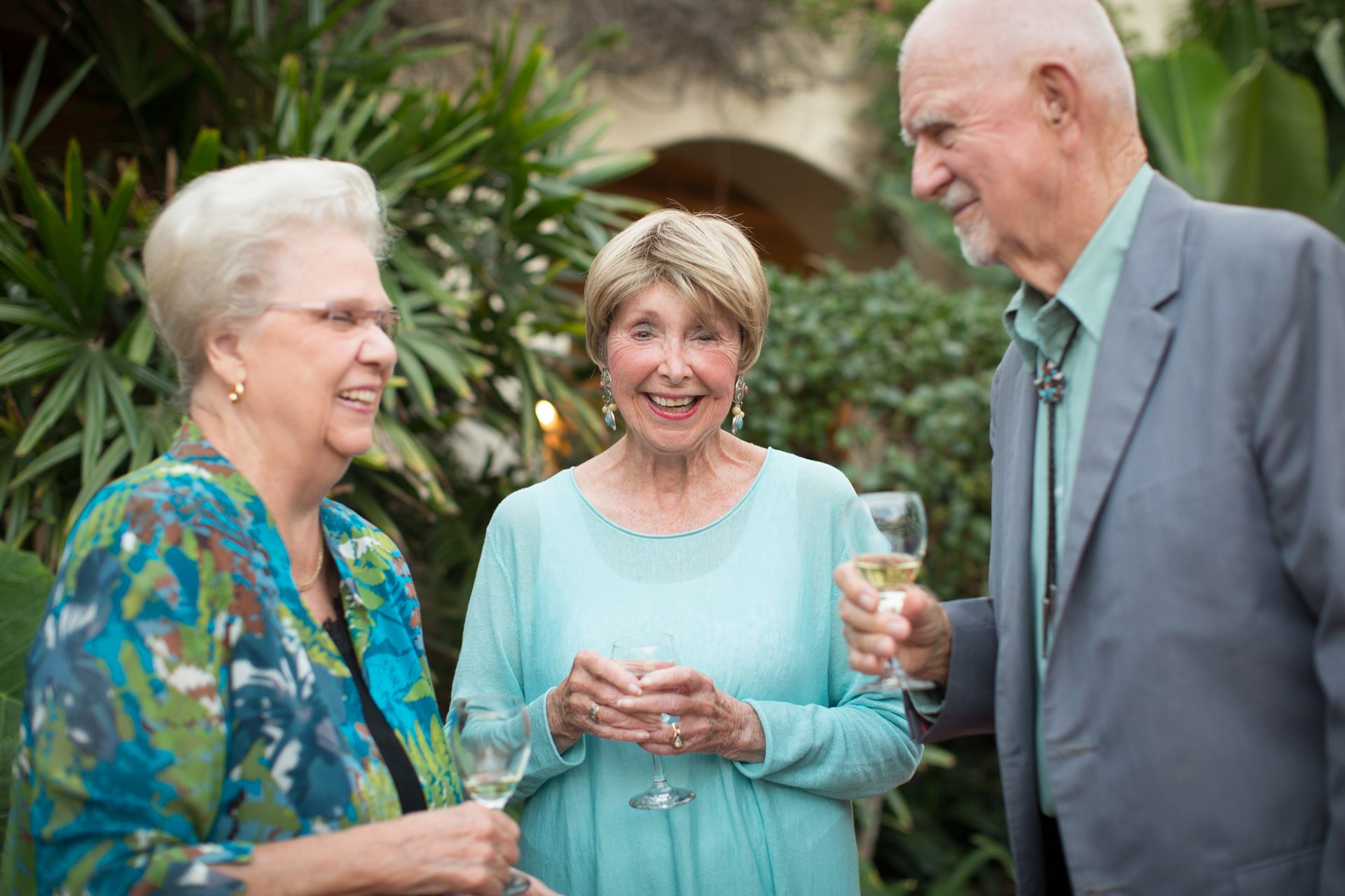 a group of seniors cheering in a retirement home