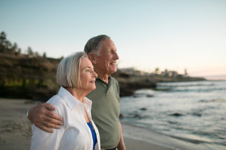 a senior couple looking at the sky