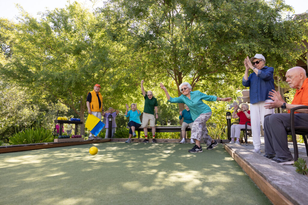 Senior women throwing bocce ball at Spring Lake Village