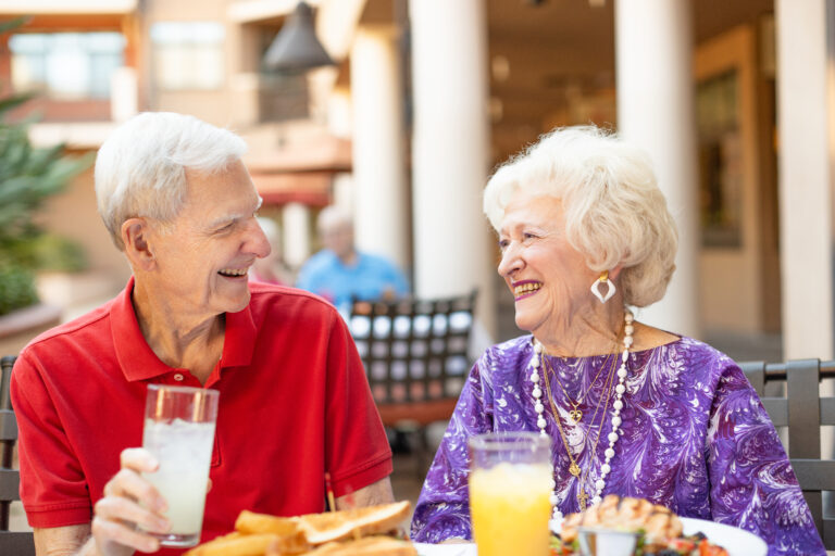 a senior couple sharing a meal