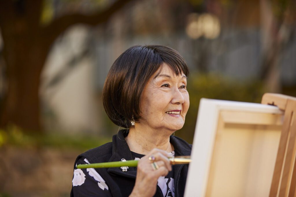 woman painting outside