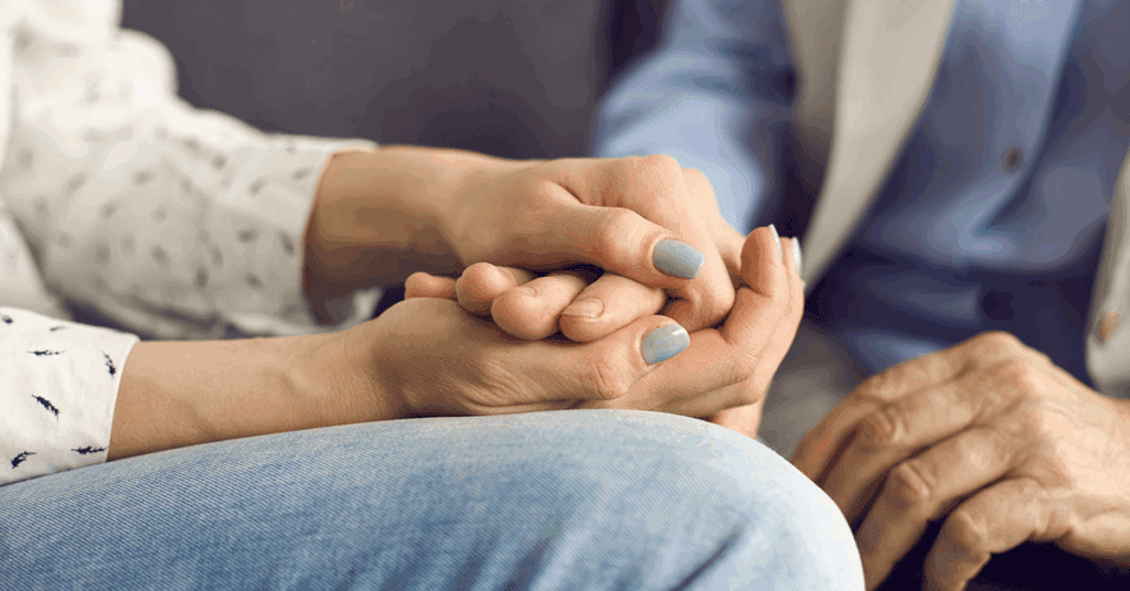 holding hands with senior