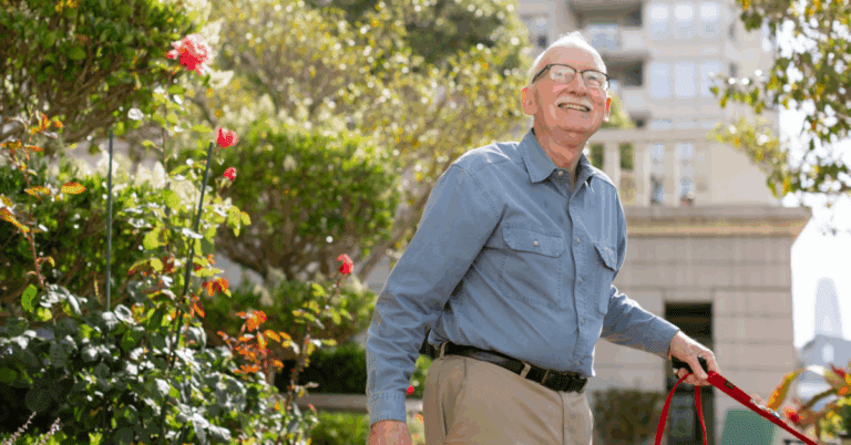 a senior man smiling at independent living