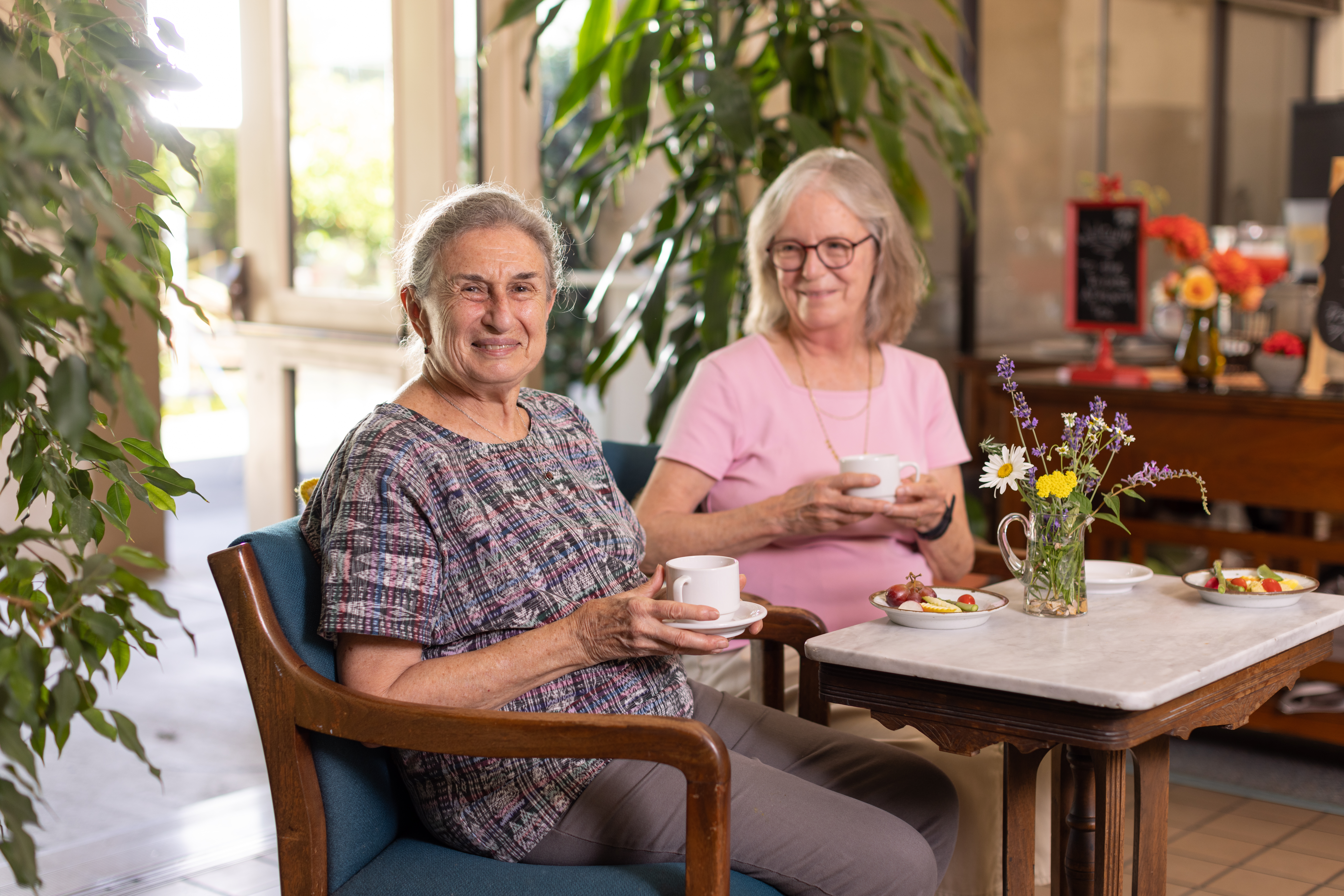 two older womans in senior living