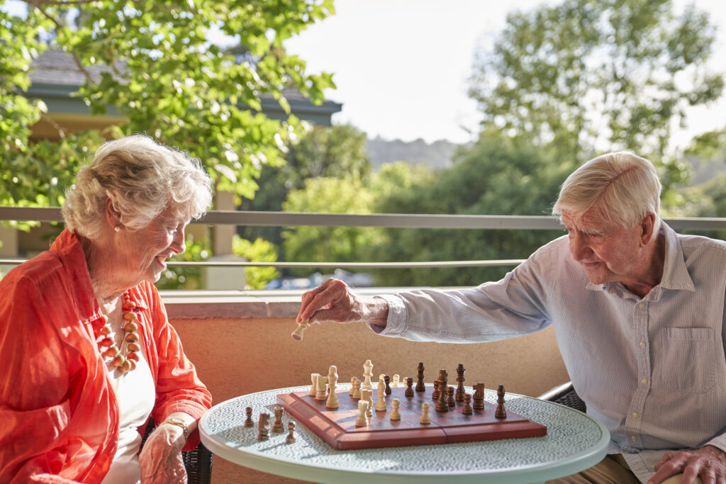 seniors playing chezz in senior communities