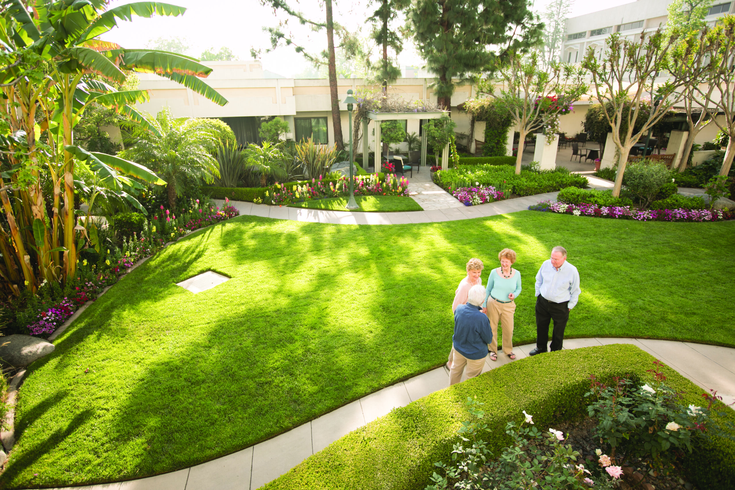 seniors walking in a heart to heart senior living community