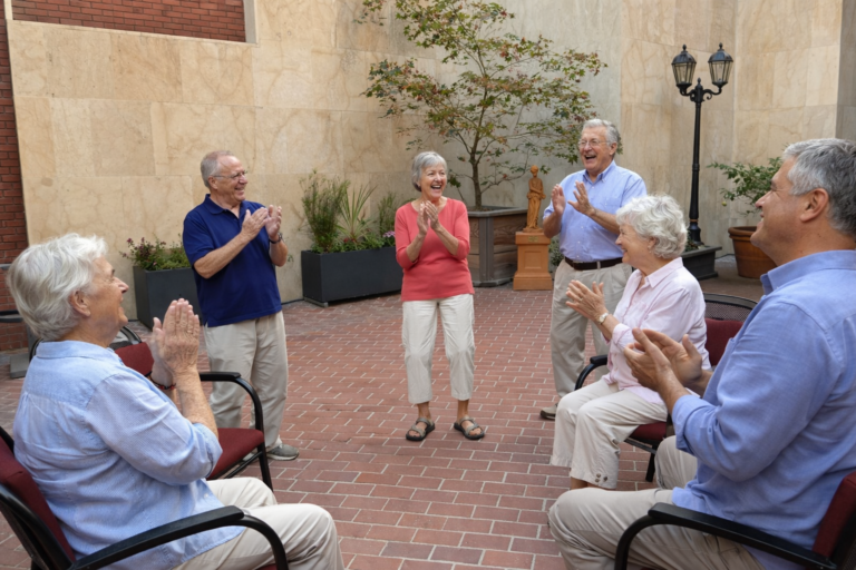 seniors clapping in retirement homes
