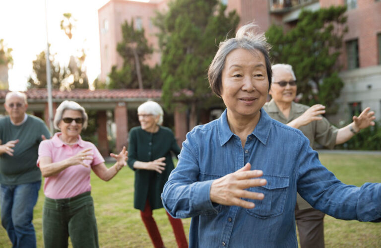 seniors doing yoga in an independent living