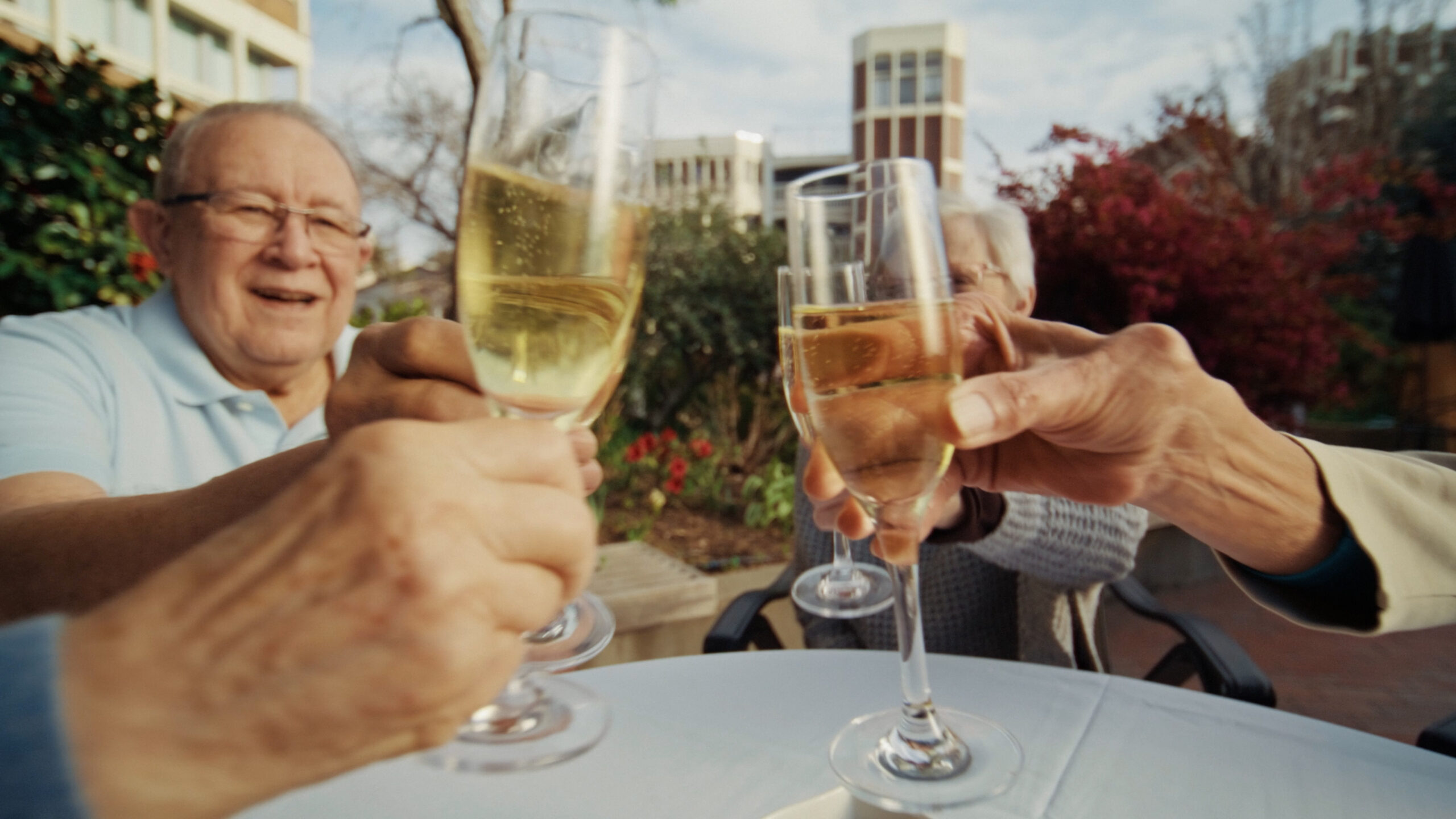 senior cheers in an independent living