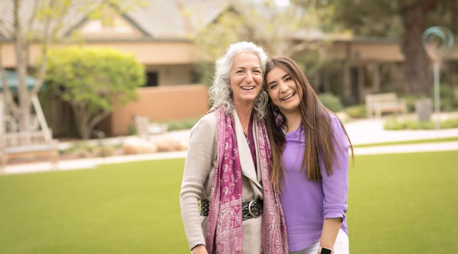 two womans smiling