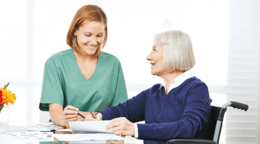 a nurse helping an old lady