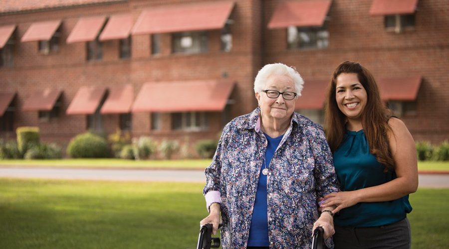 old woman with a family member