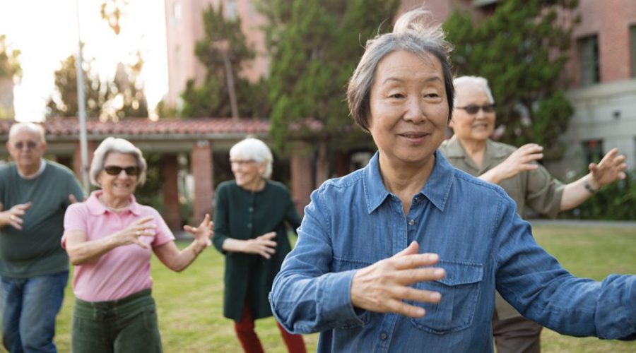 senior lady in yoga class