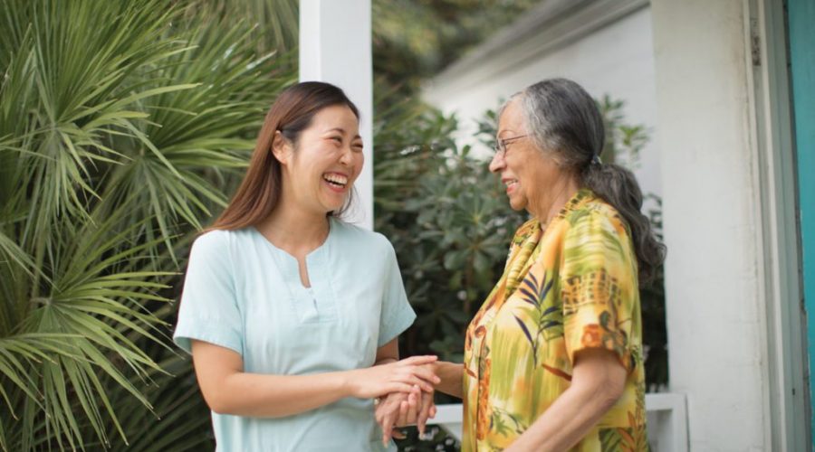 an old lady smiling at her daughter