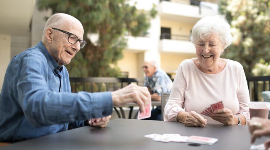 an old couple playing cards