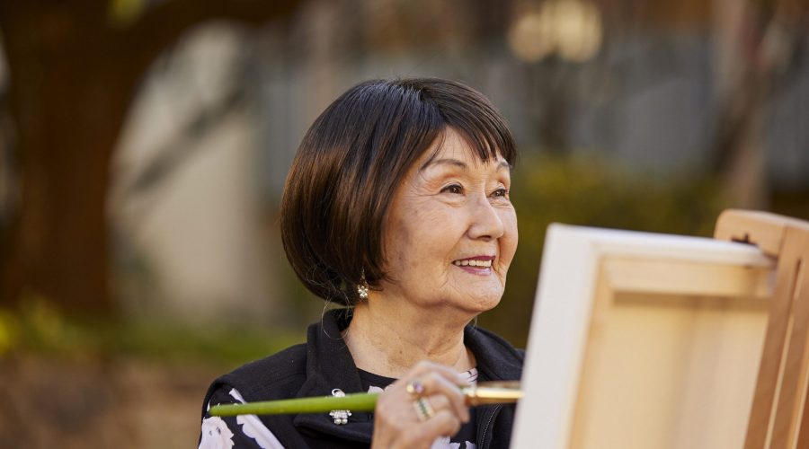 woman painting outside