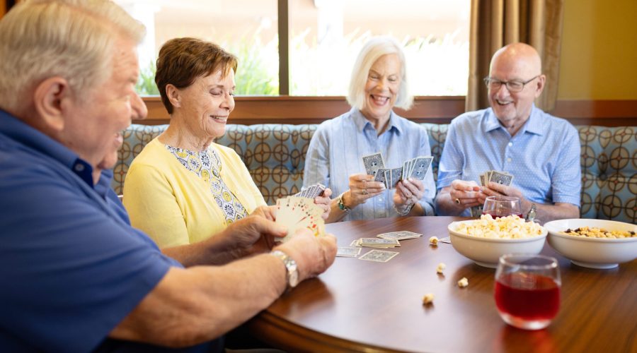 Residents gathered at Walnut Village's Red Chair Lounge