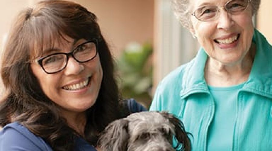 Pamela-Lowe-with-resident-and-dog