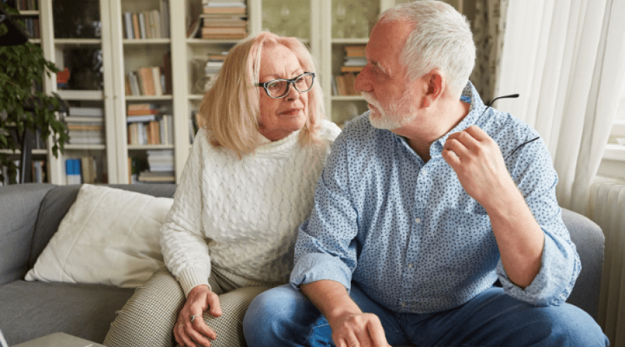 a couple of seniors having a conversation